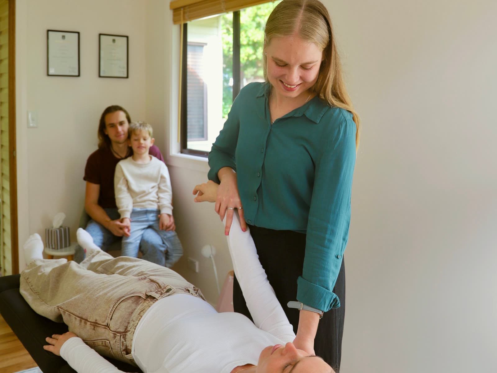 Dr Lucy with a patient in her calm Manly Vale treatment room